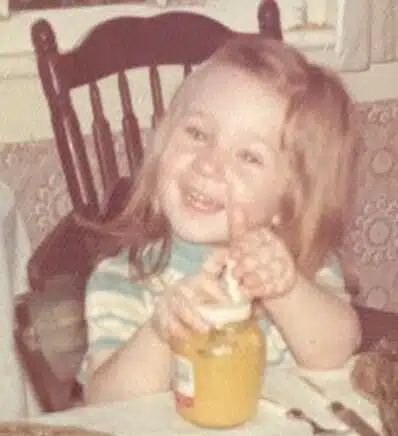 Jennifer Carlson 3 years old and acting out a mustard commercial.