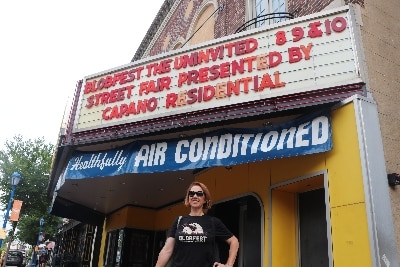 Jennifer in front of the Phoenixville Theatre marquee