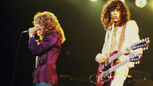 Led Zeppelin performing in concert.