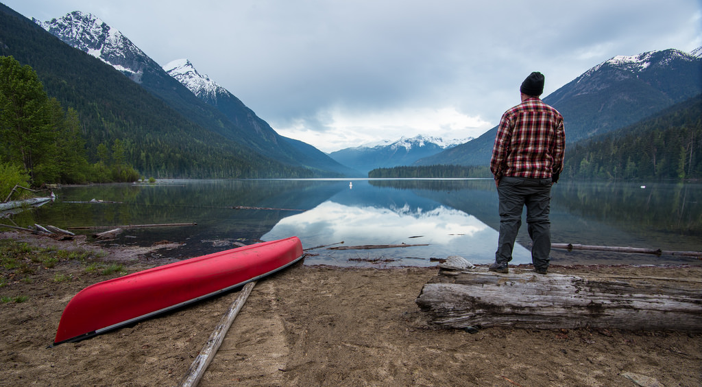 a lake and canoe