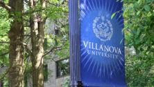 A bannar for Villanova University hangs on its campus.