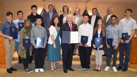 The members of the Upper Darby High School Lunar Club with members of Delaware County Council.