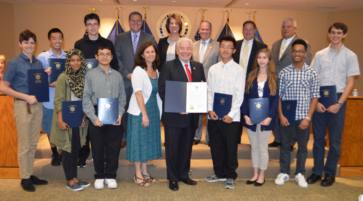 The members of the Upper Darby High School Lunar Club with members of Delaware County Council.