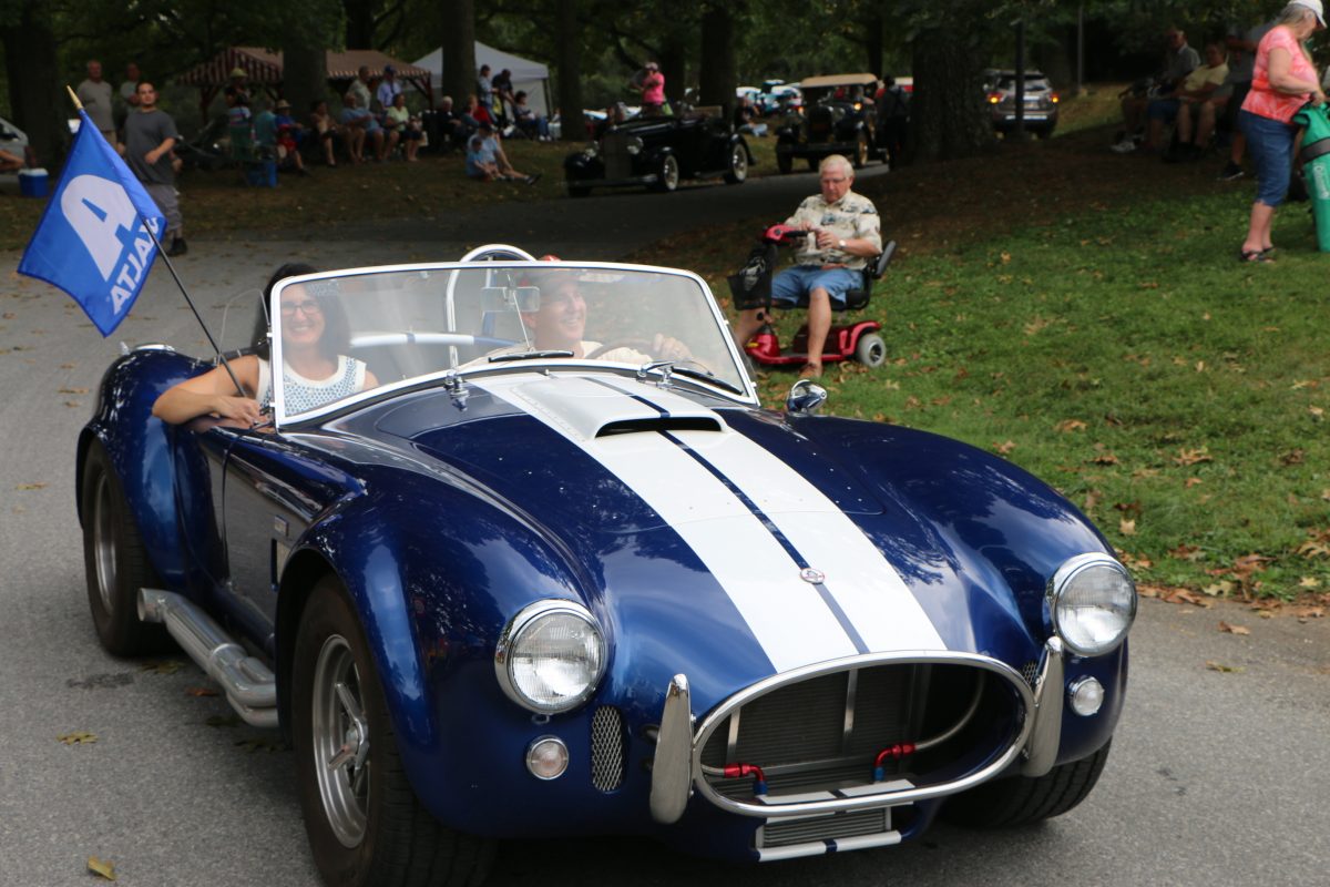 Dennis Whitaker drives his 1965 Superperformance Shelby Cobra replica.