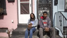 Adrienne Gilbert and Harry Lewis outside Gilbert's home.