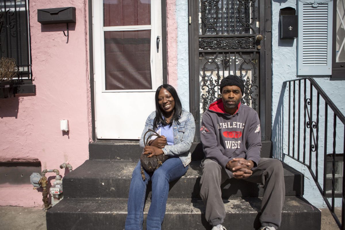 Adrienne Gilbert and Harry Lewis outside Gilbert's home.