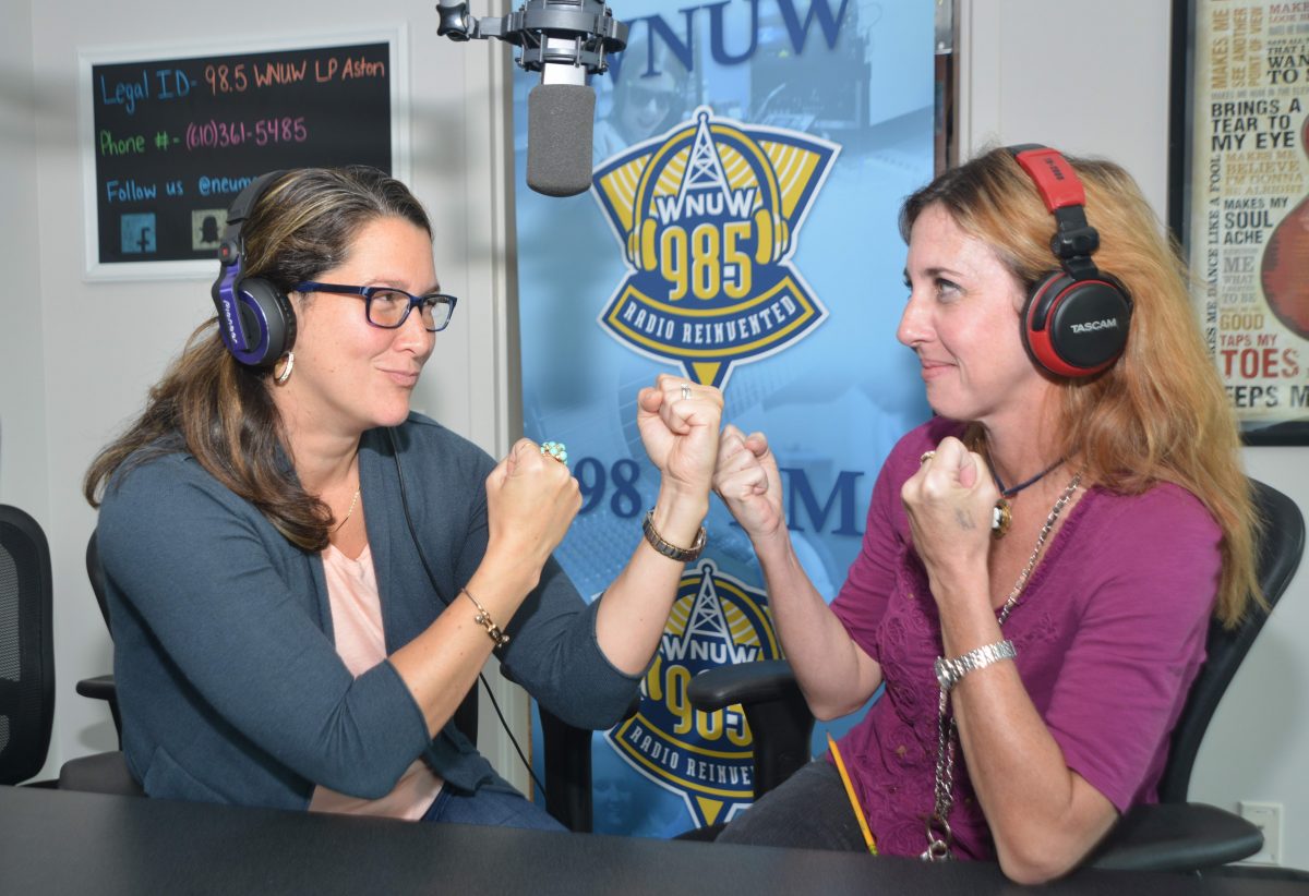 Neumann Professors Ramona Palmerio-Roberts and Colleen McDonough on the radio.