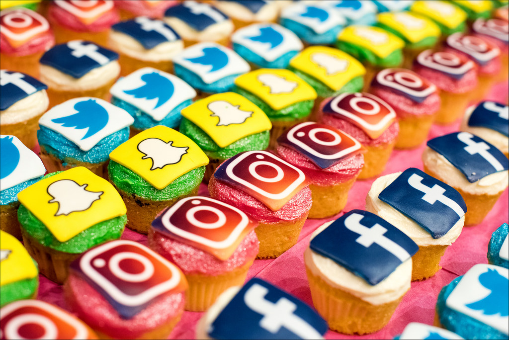 Graphic of different colored social media icons
