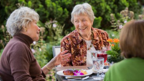 A group of women share an outdoor dining experience at Dunwoody Village in Newtown Square.