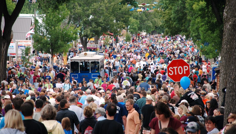 Large crowds like this pre-pandemic crowd may be seen again as places like Disneyland plan reopenings.