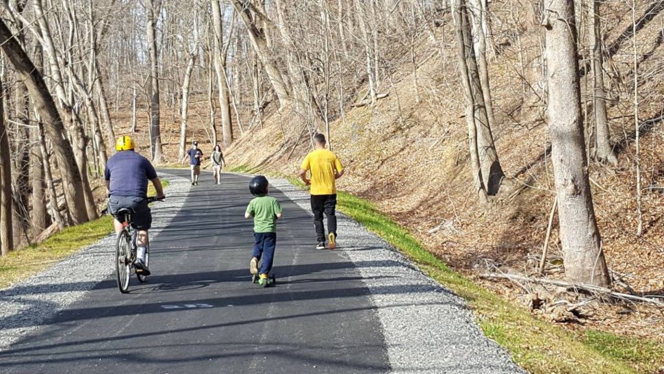 A family bikes, jobs and walks along the Chester Creek Trail