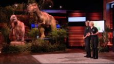 Don Lessem and Valerie Jones share the Shark Tank stage with two robotic dinosaurs