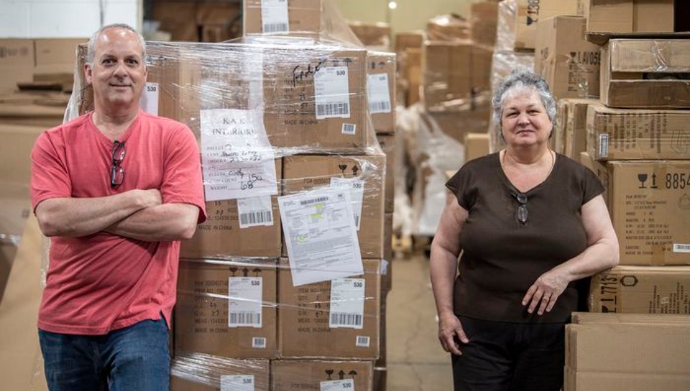 Joe Teodoro with Raelyn Harman of Teachers' Teammates, at Total Fulfilment Services, Inc. in West Chester