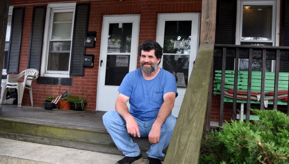Cliff Light on the porch of his Marcus Hook home.