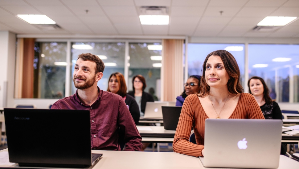 Neumann University graduate students attending a previous degree information session