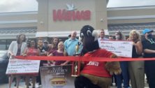 The ribbon cutting for the new Upper Darby Wawa featuring "Mare" actress Kassie Mundhenk and show technical advisor Detective Christine Bleiler.