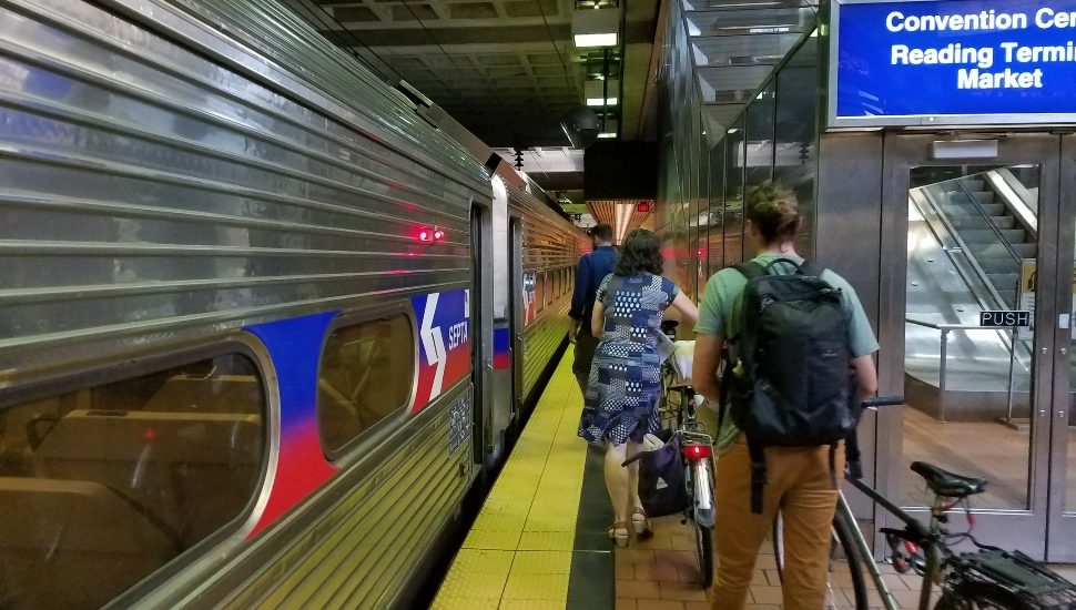 Passengers boarding an Amtrak train. A transportation bill would also include Amtrak upgrades.