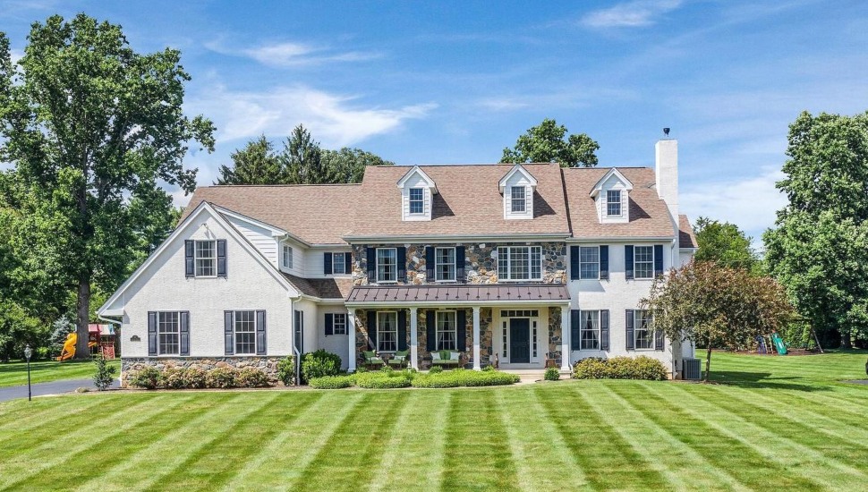 A farmhouse-style home for sale at 9 Blantyre Circle in Thornton.