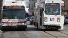 A SEPTA bus and trolley side by side.