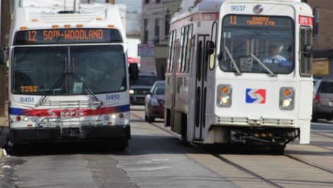 A SEPTA bus and trolley side by side.