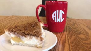 Apple Walnut pie and cup of coffee at a local coffee shop.