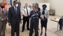 Philadelphia City Council President Darrell L. Clarke speaks at a press conference with county District Attorney Jack Stollsteimer.