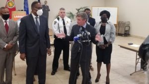 Philadelphia City Council President Darrell L. Clarke speaks at a press conference with county District Attorney Jack Stollsteimer.