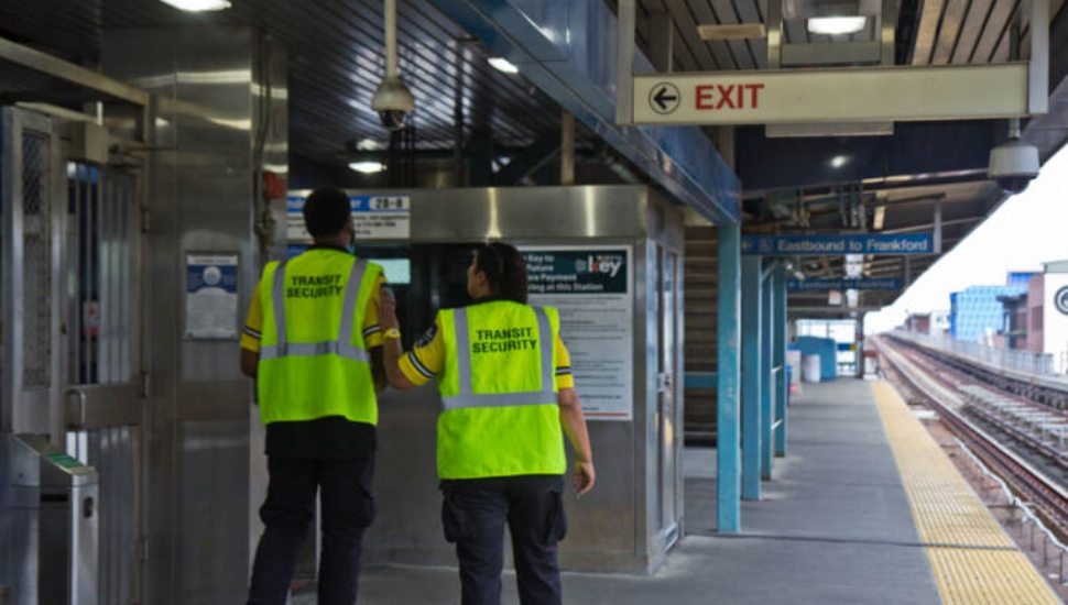 Market Frankford guards at the Girard station stop.