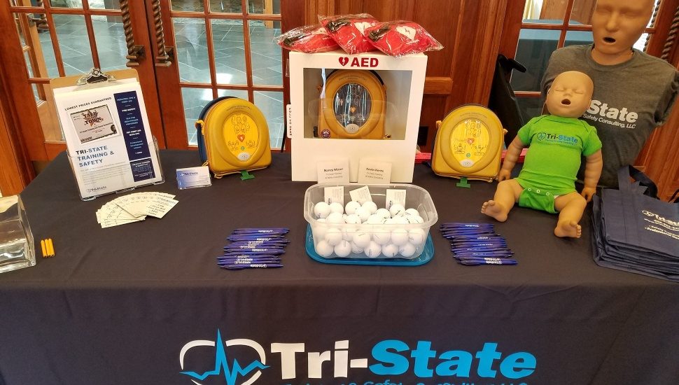 Tri-State Transportation Training and Safety Consulting, which made the Inc. fastest growing company list, has a display table of their products and services.