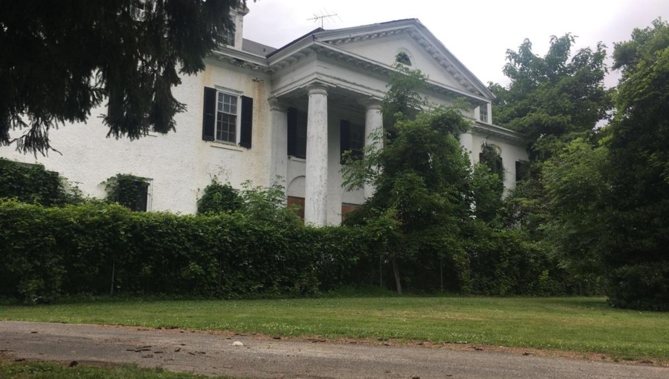 The historic Woodburne Mansion at Little Flower Manor Park in Darby Borough.