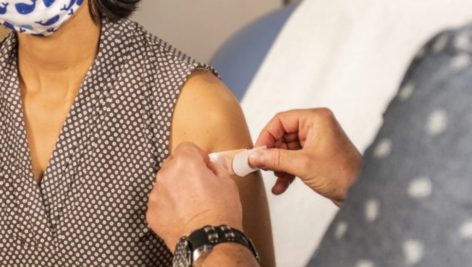 covid vaccine shot bandaid