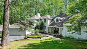 A traditional home surrounded by a wooded area at 26 Clayburgh Road in Thornton.