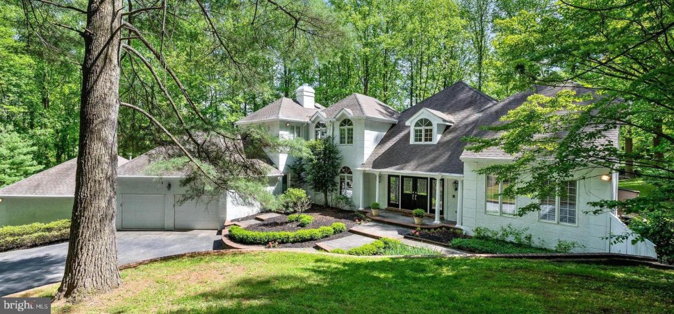 A traditional home surrounded by a wooded area at 26 Clayburgh Road in Thornton.
