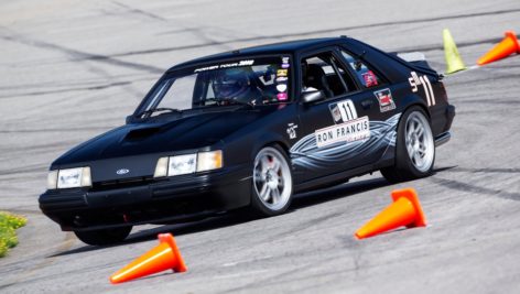Scott Bower's converted 1984 Ford Mustang promoting Ron Francis Wiring.
