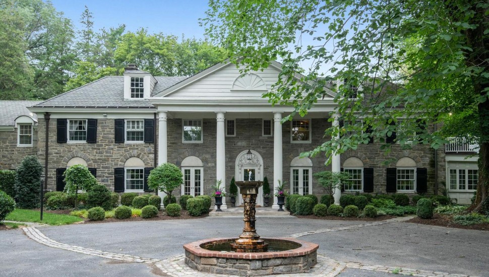 The front exterior of 101 Coopertown Road, a stately Colonial in Haverford Township