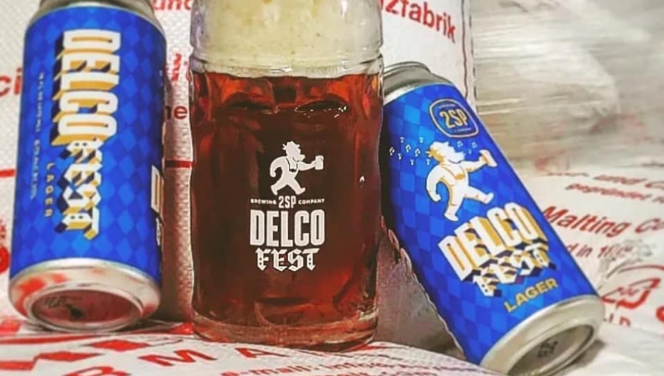 Two cans and a beer stein of DelcoFest beer from 2SP.