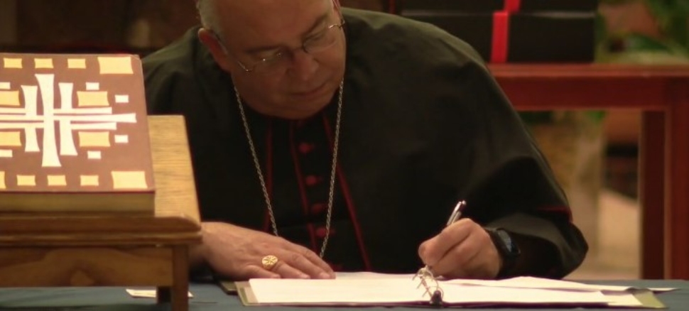 Archbishop Nelson Perez signed a cause of beatification package.