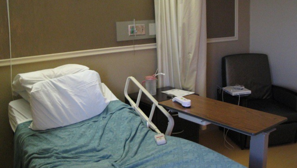 An empty hospital bed
