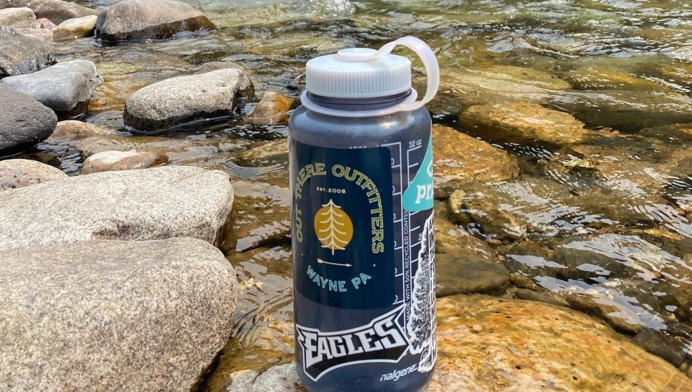 water bottle on river