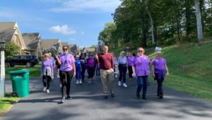 Dunwoody Village staff and residents do a fundraising walk for the Alzheimer's Association.
