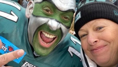 Mary Kate Mink takes a selfie with Eagles superfan Jamie Pagliei .