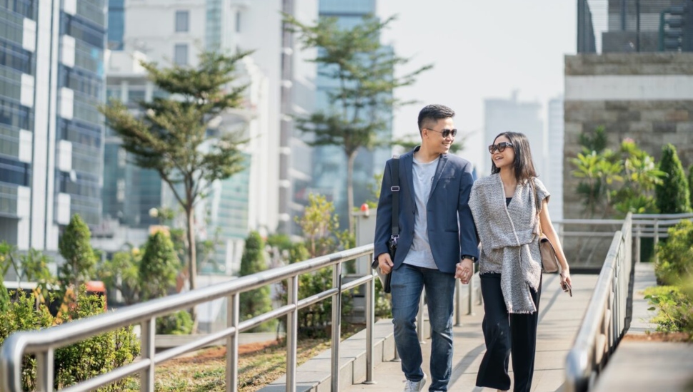 Perfection seems to have found this couple walking together through the city.