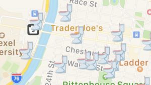 A screenshot of the Where2Go app showing a street map with toilet icons.