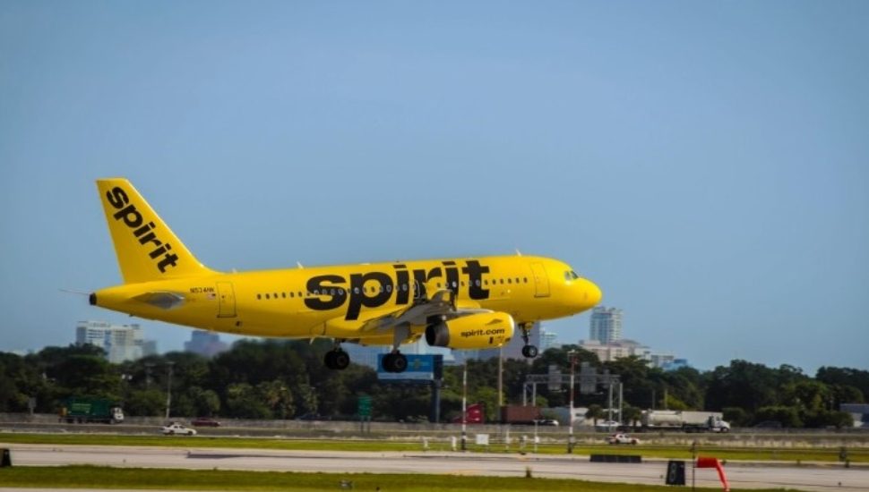 A Spirit Airlines aircraft taking off from Philadelphia International Airport.