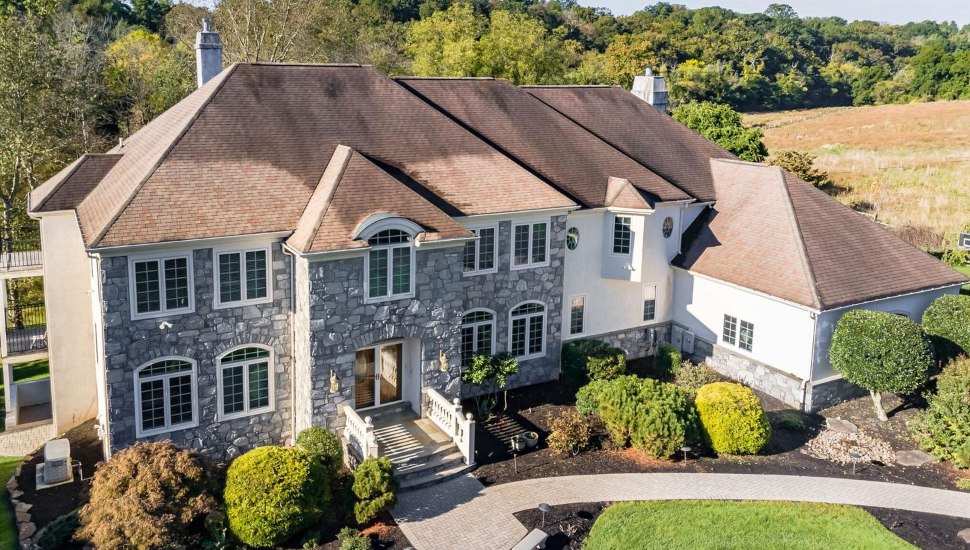 A secluded custom-built home at 7 Bridlebrook Lane in Mediia.