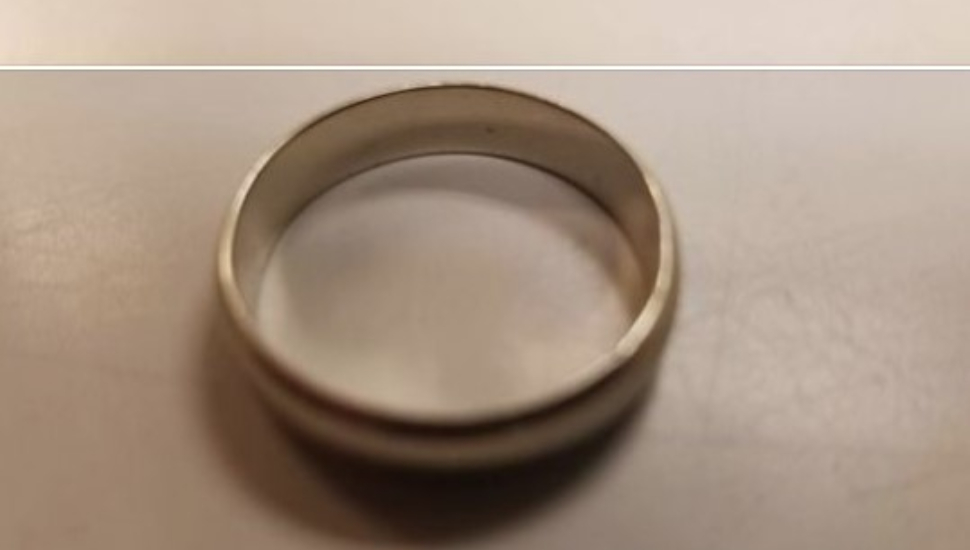 A men's silver wedding band.