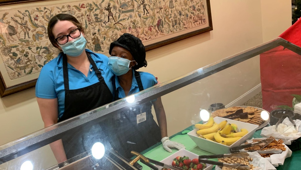 A food server at Dunwoody Village in Newtown Square.