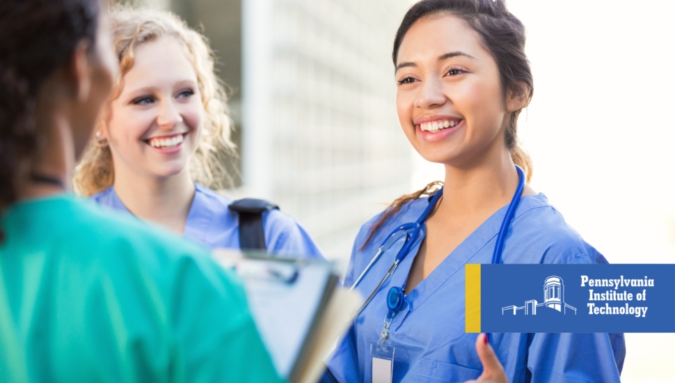 3 nurses talking with each other.