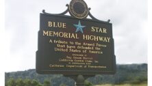 A Blue Star Memorial Highway Marker out in California.