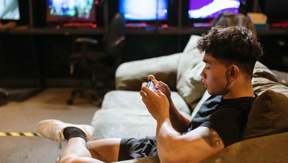 man looking at phone